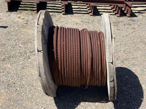1-Inch Steel Wire Cable Wooden Spool. Length unknown.
