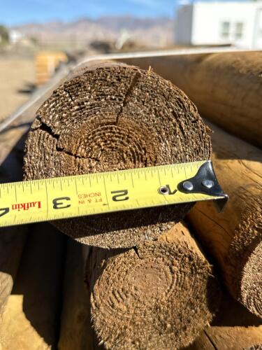 Bundle of 100 Pressure-Treated 7-Foot x 3-Inch Round Wood Fence Posts Grade 4 - 3