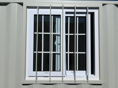 11ft New Modified Shipping Container &ndash; Side Door, Window w/ Security Bars - 11