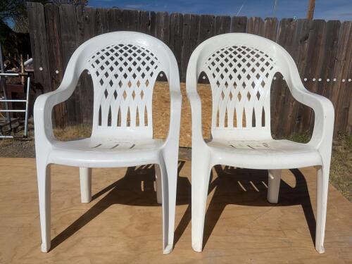 (2) White Stackable Plastic Outdoor Patio Armchairs