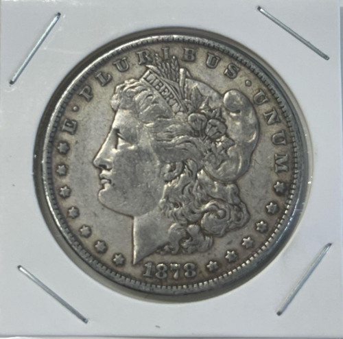 1878 Morgan Silver Dollar In protective Holder