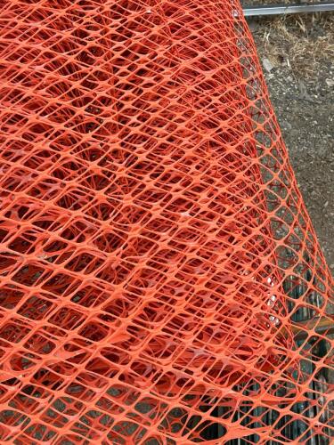Multiple Rolls Of Orange Construction Netting Barrier - 3