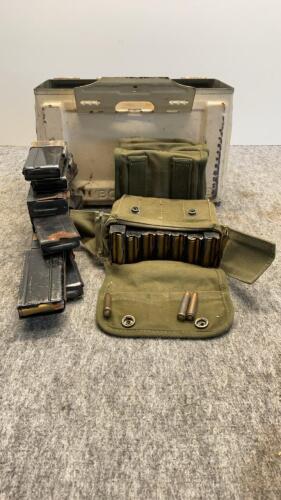Pale white ammo box with four ammo pouches